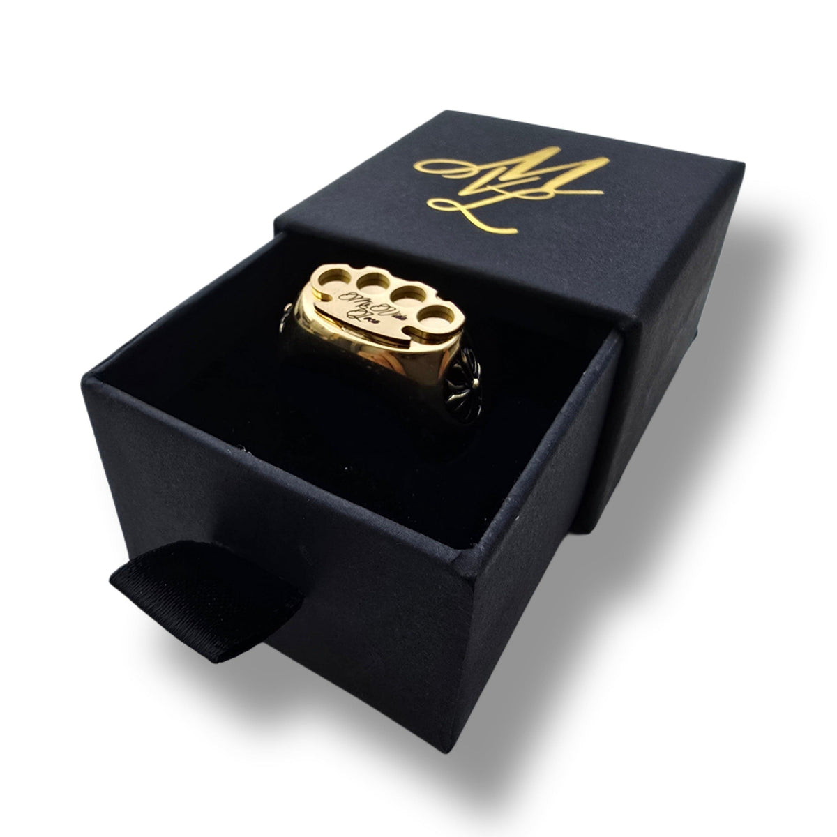 Gold MVL Logo ring in the open black ring box with gold MVL logo