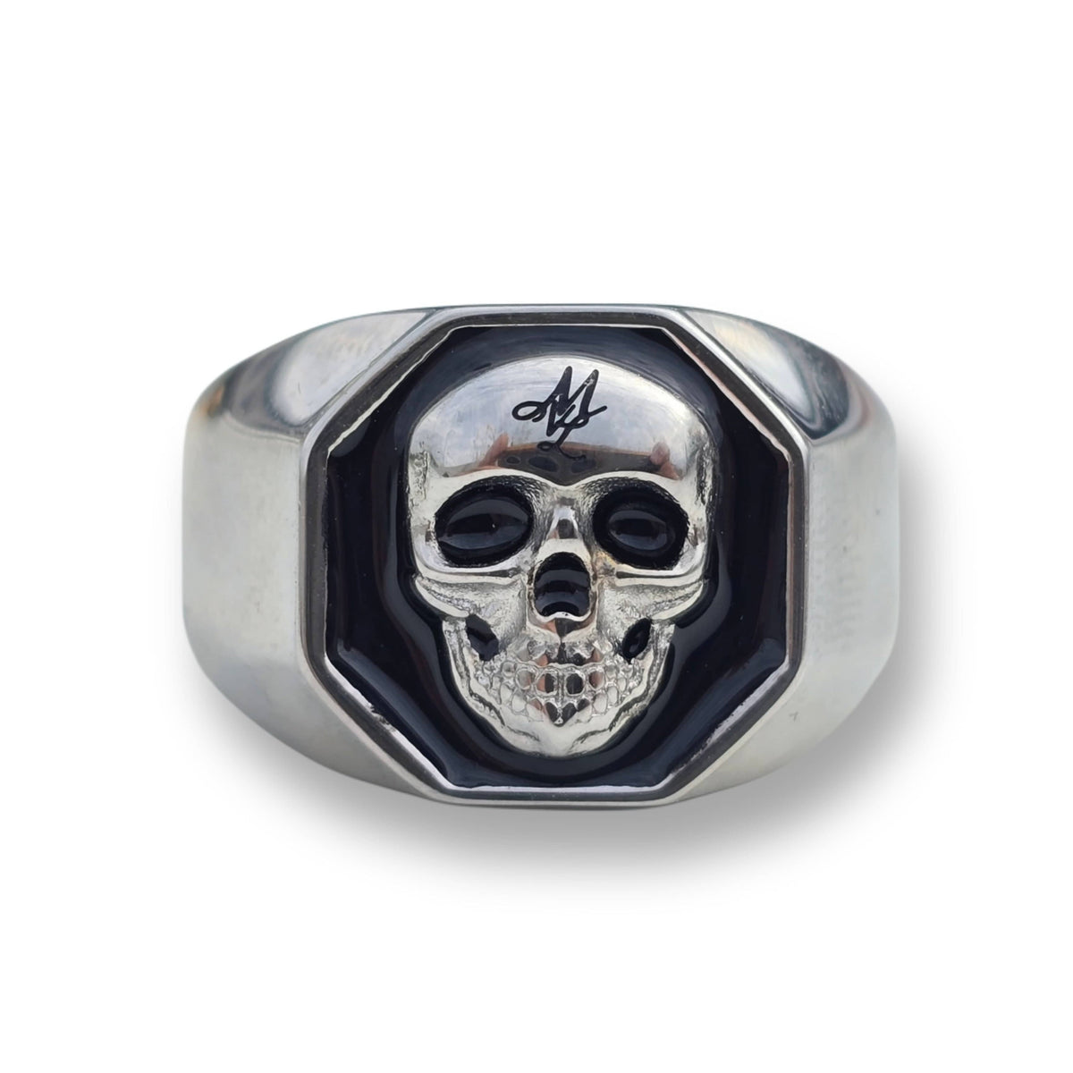 Front view of the silver MVL 3D Skull ring with relief skull on a black background in the head