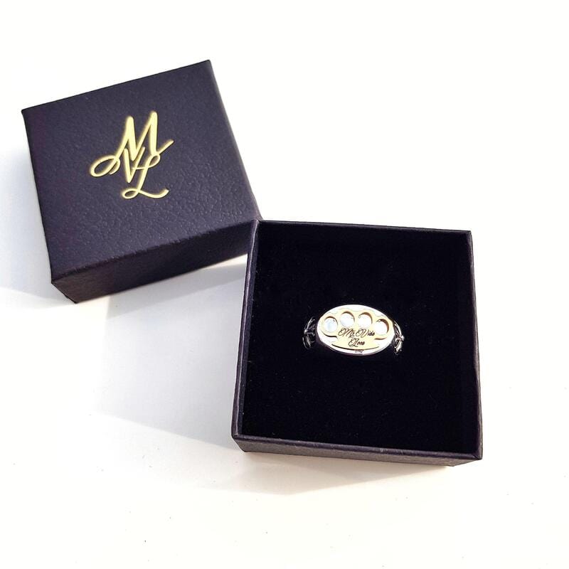 MVL Logo ring in silver in an open black ring box with gold ML monogram
