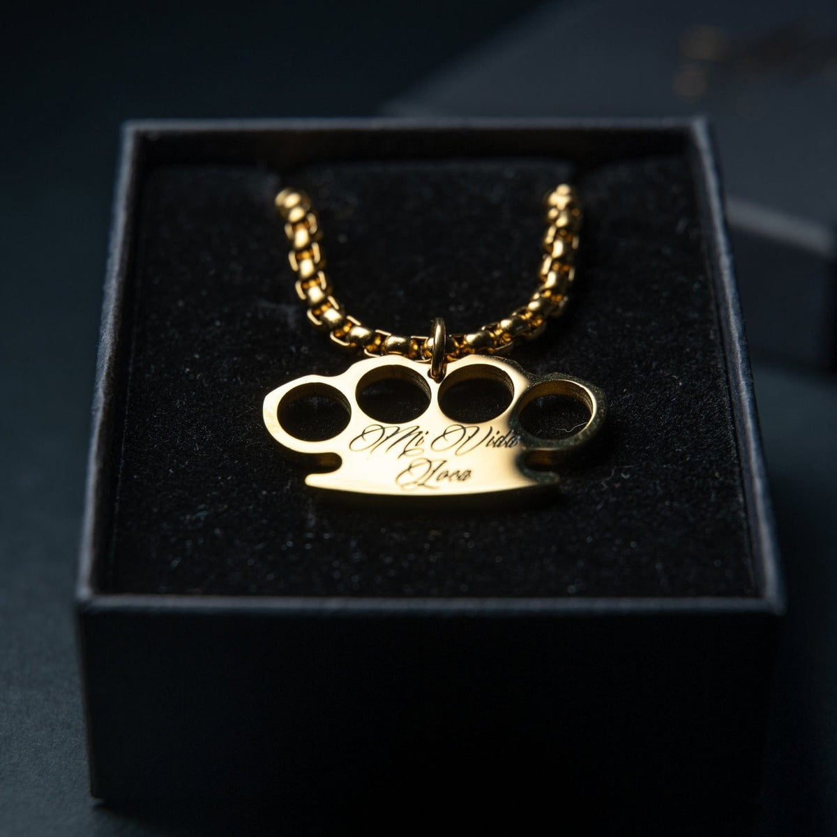 Mi Vida Loca MVL Logo necklace in gold with gold MVL logo pendant with engraving, in the black gift box