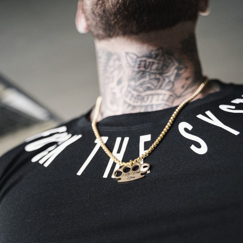 Gold MVL Logo necklace with pendant worn over a black T-shirt, seen from behind