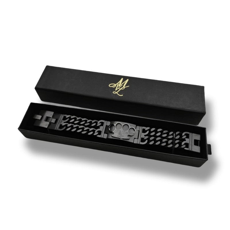 Pulsera Mi Vida Loca Black line negra con placa del logo MVL en la caja negra abierta